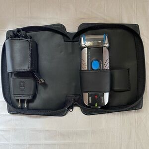 Braun Electric Shaver with Black and Blue Accents